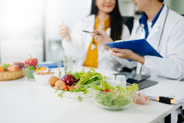 Nutritionists consulting on healthy food choices, meal planning, and wellness concepts