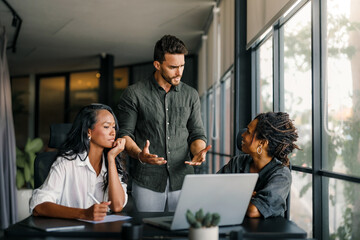 Colleagues arguing at workplace, executives disagree about papers, found error in contract