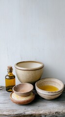 Ceramic bowls and oil, rustic background, still life, for home decor, or spa concept