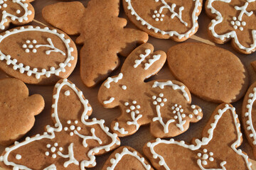 Undecorated and decorated Easter gingerbread cookies of various shapes
