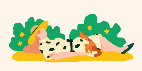 Obraz premium A carefree woman is lying down with a cat in the garden, basking in the warmth of a sunny day, embodying the simplicity of contentment and relaxation. 