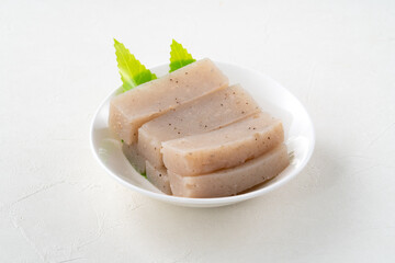 Raw konjac in square shape, also named konnyaku in Japan.