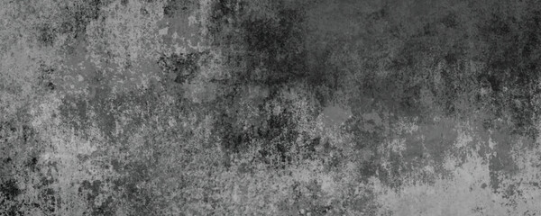 A Heavy and Dramatic Aesthetic Created by the Dark and Worn Surface of an Aged Wall

