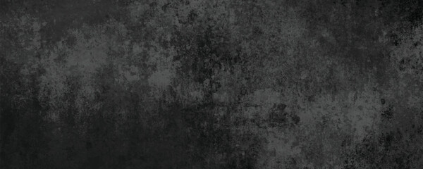 Obraz premium A Naturally Cracked and Eroded Dark Surface with Unique Abstract and Weathered Patterns