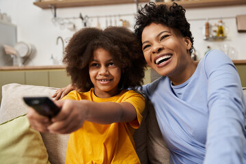 Family bonding time with laughter and joy on a cozy weekend evening at home