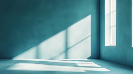 Obraz premium Empty room with teal walls and sunlight