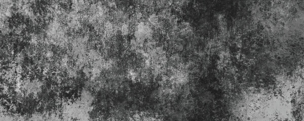 The Timeworn and Scratched Surface of a Darkened Concrete Wall with Industrial Appeal

