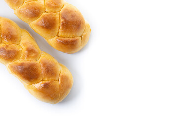 Traditional Easter braided bread. Tsoureki braid isolated on white background. Top view. Copy space