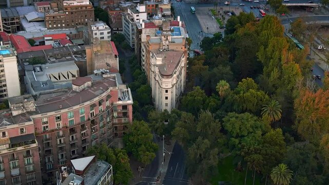 Aerial fly above urban park and french urban architecture famous building in Santiago de Chile, Chilean cityscape