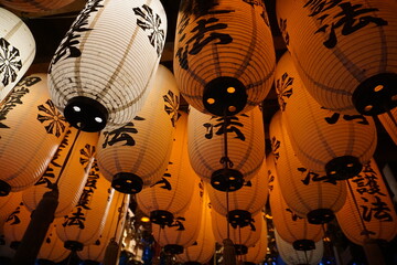 Many lanterns decorated in a Japanese temple