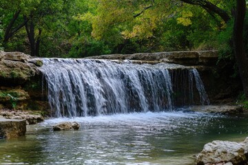 Obraz premium Cedar Park Texas. Twin Lakes Trail Waterfall - Picturesque Cascade in Nature