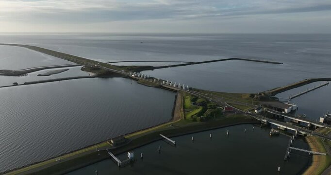 Lorentz locks, water way, transportation infrastructure at the Afsluitdijk, Kornwerderzand, Friesland, The Netherlands. Aerial drone view.