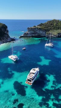 Sailing boats anchored in beautiful bay on Corfu Island, Greece