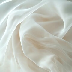 Fototapeta premium Close-up of delicate white silk fabric with soft, flowing texture