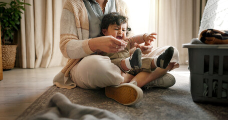 Crying, playing and mother with baby in home with tantrum, frustration and upset for development....