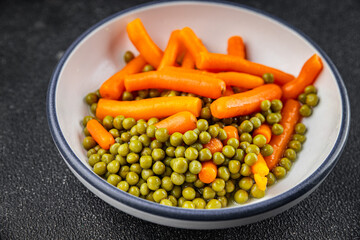 Green peas and carrot canned food tasty fresh delicious gourmet food background table rustic food top view copy space keto and paleo diet vegetarian and vegan food