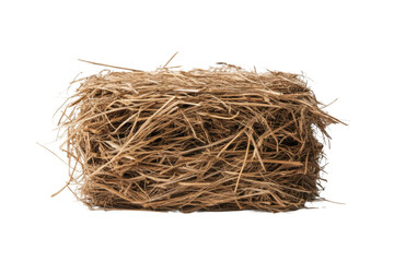 Obraz premium Square hay bale: dried grass bundle for animal feed and farming use, cut out