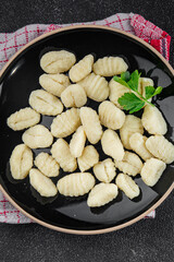 Gnocchi tasty fresh delicious gourmet food background table rustic food top view copy space keto and paleo diet vegetarian and vegan food