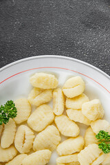 Gnocchi tasty fresh delicious gourmet food background table rustic food top view copy space keto and paleo diet vegetarian and vegan food
