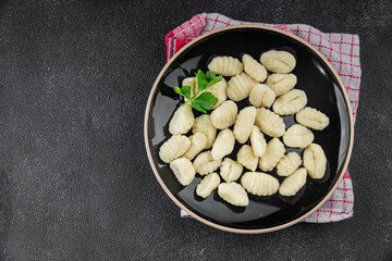 Gnocchi tasty fresh delicious gourmet food background table rustic food top view copy space keto and paleo diet vegetarian and vegan food