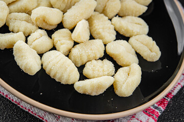 Gnocchi tasty fresh delicious gourmet food background table rustic food top view copy space keto and paleo diet vegetarian and vegan food