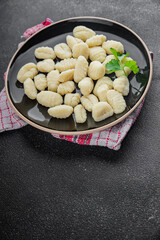 Gnocchi tasty fresh delicious gourmet food background table rustic food top view copy space keto and paleo diet vegetarian and vegan food