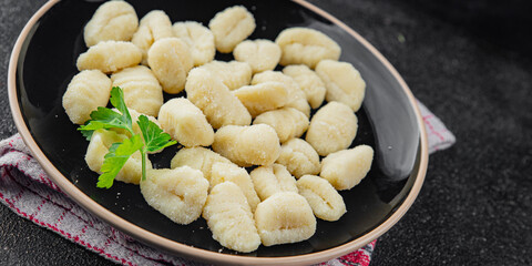Gnocchi tasty fresh delicious gourmet food background table rustic food top view copy space keto and paleo diet vegetarian and vegan food