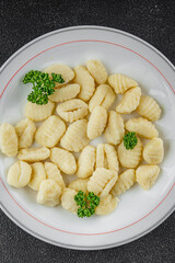 Gnocchi tasty fresh delicious gourmet food background table rustic food top view copy space keto and paleo diet vegetarian and vegan food