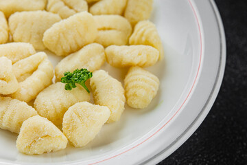 Gnocchi tasty fresh delicious gourmet food background table rustic food top view copy space keto and paleo diet vegetarian and vegan food