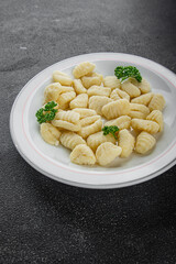 Gnocchi tasty fresh delicious gourmet food background table rustic food top view copy space keto and paleo diet vegetarian and vegan food