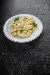 Gnocchi tasty fresh delicious gourmet food background table rustic food top view copy space keto and paleo diet vegetarian and vegan food