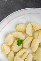Gnocchi tasty fresh delicious gourmet food background table rustic food top view copy space keto and paleo diet vegetarian and vegan food