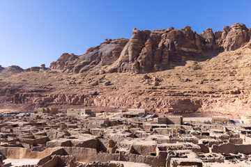 Elevated view over AlUla valley with old town and modern road, Saudi Arabia