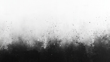 Obraz premium Abstract black and white painting with dynamic splatter effect on a textured background.