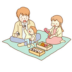レジャーシートを敷いて親子3人でピクニックランチ