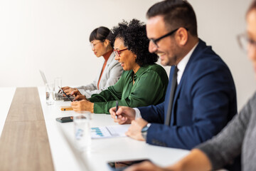 Professional Team Meeting in Modern Office Setting
