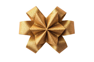 Sparkling golden gift bow on black background shiny decorative ribbon, cut out