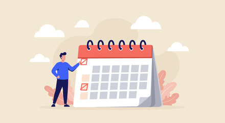 Man checking dates on a large calendar.