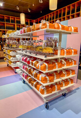 Artisanal Cakes and Gift-Wrapped Panettone in Gourmet Boutique