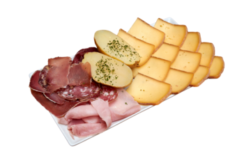 Cheese raclette prepared on plate for a dinner party