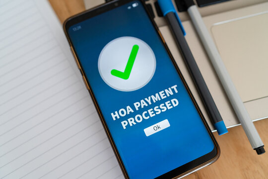 Notification of successful HOA payment. Concept of paying Home Owners Association fees for your neighborhood.