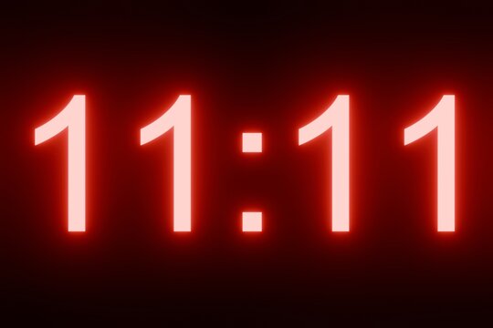 Angel numbers, as seen by people on digital watches or other devices. They are said to have special meaning in manifestation and other spiritual techniques. Red ciphers. 
