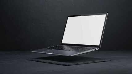 Sleek silver laptop hovers above dark slate, blank screen ready for design or text, showcasing modern technology and minimalist elegance