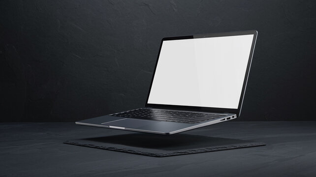 Sleek silver laptop hovers above dark slate, blank screen ready for design or text, showcasing modern technology and minimalist elegance
