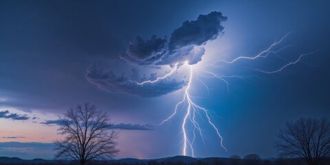 Fototapeta premium Majestic splendor of a lightning storm illuminating the night sky above a silent landscape