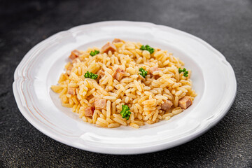 Rice with ham meat main course delicious fresh delicious gourmet food background on the table rustic food top view copy space