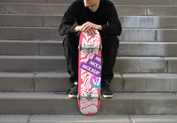 Mockup of a Skater with a Skateboard Deck