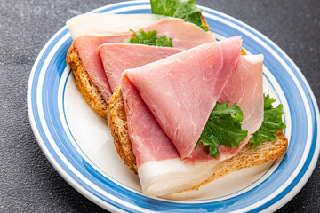 Sandwich ham tasty fresh delicious gourmet food background on table rustic food top view copy space