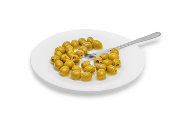 Green olives with fork on white plate