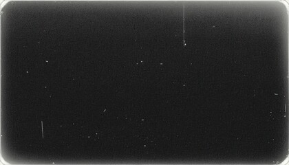 grainy black film texture with dust and scratches, vintage distressed overlay, old analog aesthetic, retro visual effect

